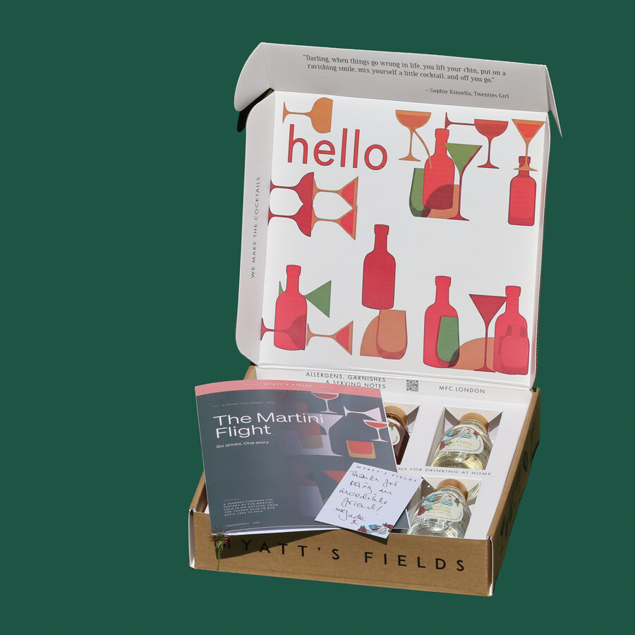 The Martini Flight box, open, with the six minis, the brochure and a hand-written card
